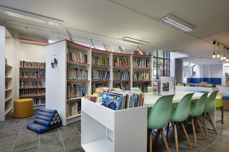 A library with so much books and chairs for students who are interested in reading good books.